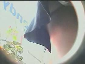 Upskirt candid camera video of a woman on the street