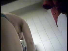 Having shown nude back on spy cam girl starts dressing on