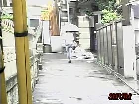 Rainy sharking action with fabulous oriental beauty being totally surprised