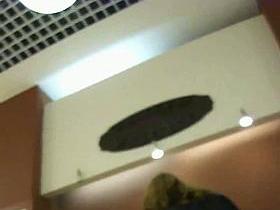 Three skinny bitches in knee-high boots get filmed in an upskirt video