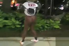 Black mama exposes her big tits on the street