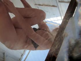 Fem in erotic lingerie unconsciously shows body treasures