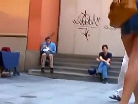 Perfect young butt cheeks under a skirt