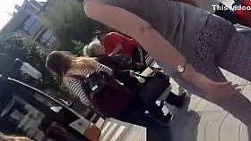 Tight pants girl goes to metro stop