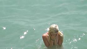 Slim blonde gets fucked with her boyfriend at a public beach