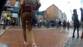 Two skinny teens walking in tight leggings