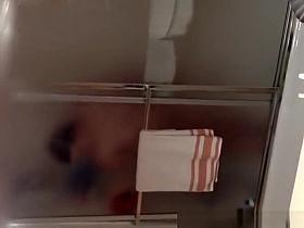 Stepson secretly films his stepmom in shower