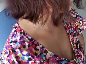 Lovely Japanese girl in a hot dress with nice decolete