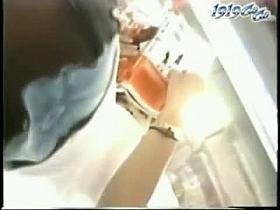 Asian sweetie falls prey to an upskirt chaser in a bookstore