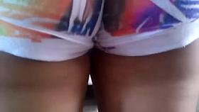 Nice-ass chick is filmed by a guy with voyeur cam