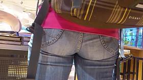 Nice fanny in blue jeans caught in a street candid clip