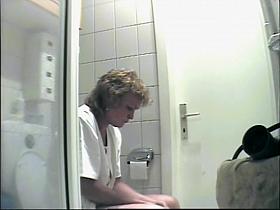 Mature is being filmed when urinating in the bathroom