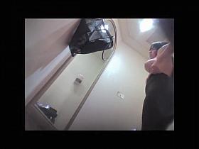 Very slim girl on changing room spy cam erotica