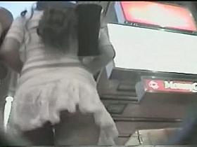 Beautiful ass upskirt under a pink skirt on the street in public