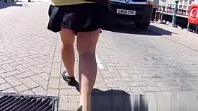 Wind lifts upskirt and exposes butt