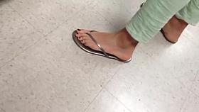 Candid feet painted toes in Flip Flops