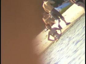 A horny voyeur loves filming hot nudity on the beach.