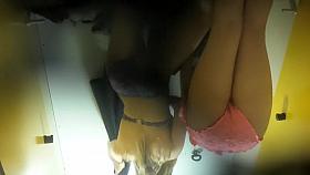 Spy cam films a couple of nice butts as they change into ba