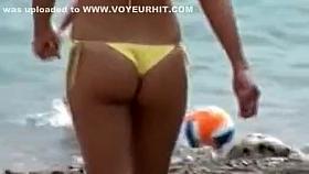 Serbian folk singer spied on a beach