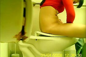 Hidden cam caught a gentle girl pissing