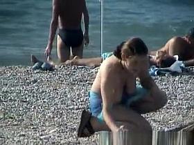 Topless Woman on the Beach