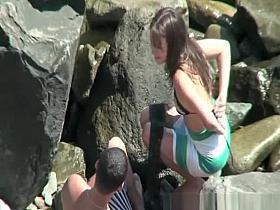 Teen couple spied fucking between the rocks