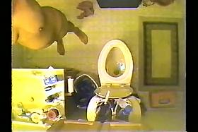 Voyeur spy cam filmed a sexy vixen stripping