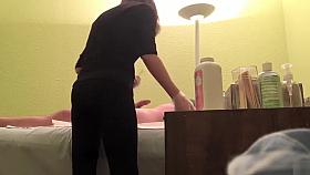 Hidden cam reveals a wax master giving handjob to horny client