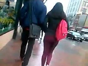 Candid booty in dark red jeans