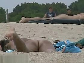 Voyeur beach shots of amateur people sunbathing nude