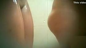 Two women spied on in the same shower