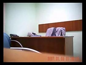 Hidden cam catches redhead in quick office fuck