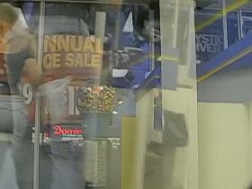 Fit blonde walking down the street candid with a superb body