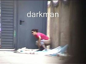 The bunch of shameless amateur girls pissing in the gate