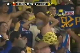 Sexy soccer fan flashes fans by accident