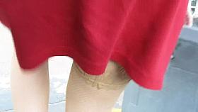 Red dress and fishnet stockings