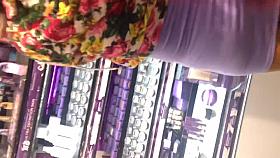 Sexy Asian in purple dress showing thong