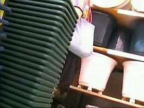 Asian MILF up skirt and up blouse in a store