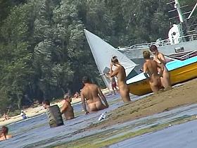 Hot mature women filmed by a voyeur on the nudist beach