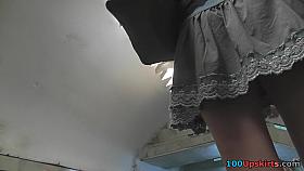 Upskirt girl exposes her flabby ass for the spectators