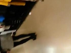 Woman in black stockings and short skirt upskirt