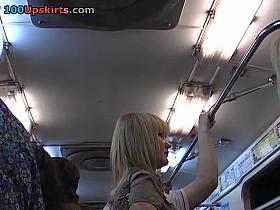 Blond upskirt angel in a trendy costume