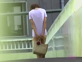 Colorful oriental doll loses her sexy skirt when some sharking chap steals it