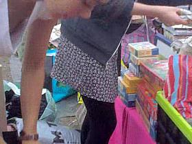 Cute girl leans forward and gets her sexy downblouse peeped