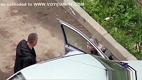 Drunk woman peeing in the parking