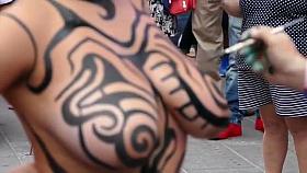 Big tits girl public body painting