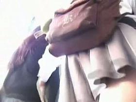 Lilac panties revealed in a street upskirt voyeur hunt