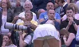 Sweaty tennis babe bending over after match