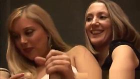 CFNM get a kick out ot stroking guys hard dick on the sofa