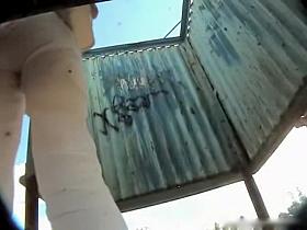 Sweetie in beach change cabin changes cloths and shows body